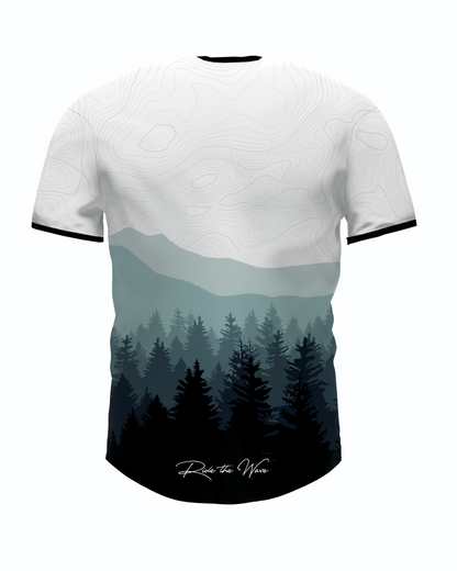 t-shirts with a mountain and forest design on a white background