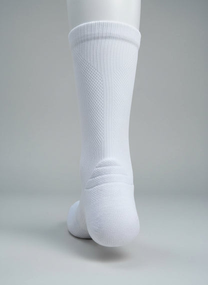 White knee-high socks on a light gray background